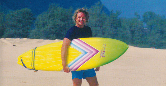 Corky Carroll Holding Surfboard