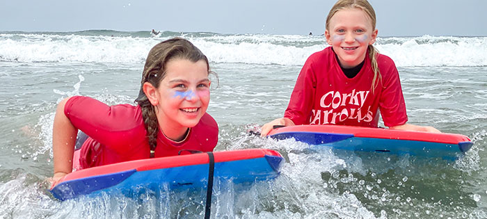 Two girls at boogie board surf camp
